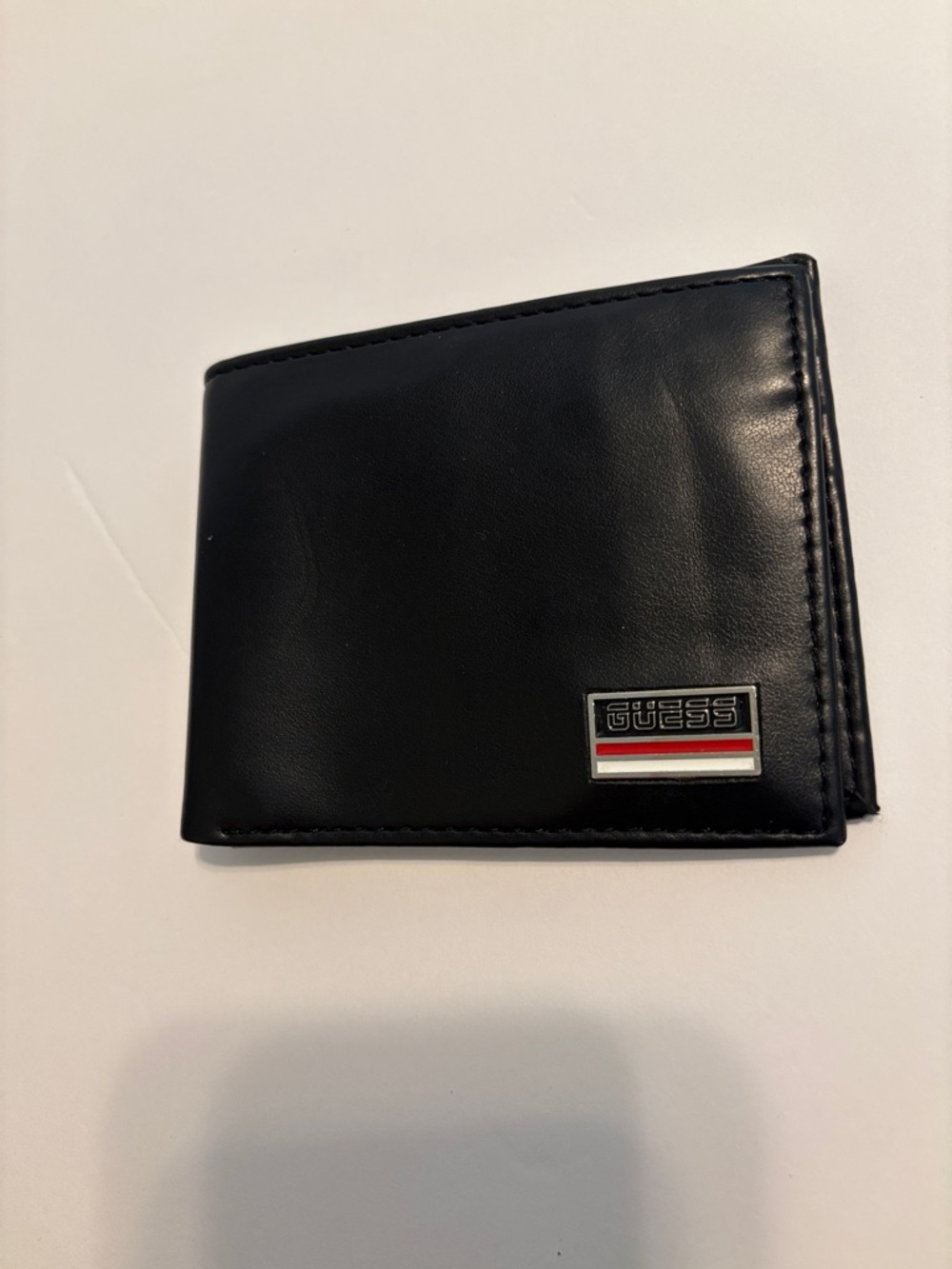 GUESS Black Men's Leather Wallet with Logo Plaque and Red-Trim Accent